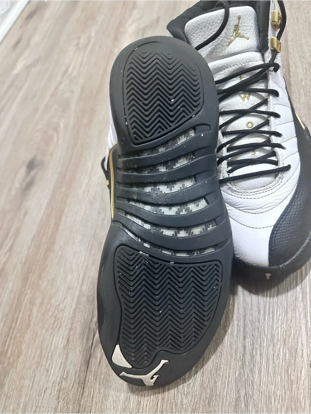 Jordan Men's White and Black High-Top Sneakers with Gold Accents
